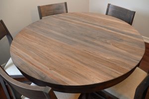 Cumberland Round Table 48” + 3-12” - Handstone - Wormy Maple, Brushwork Finish, Oyster Stain, Kanata Chairs